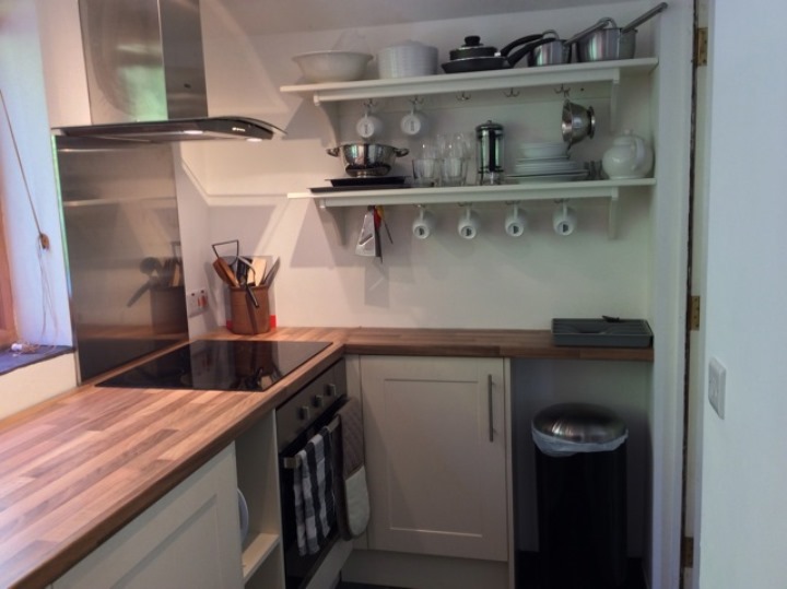 Woodpecker Annexe: the kitchen, showing the ceramic hob
